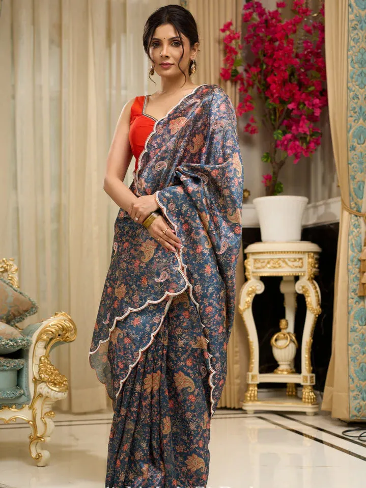 Floral printed saree with delicate hand embroidery and scalloped embroidered edges