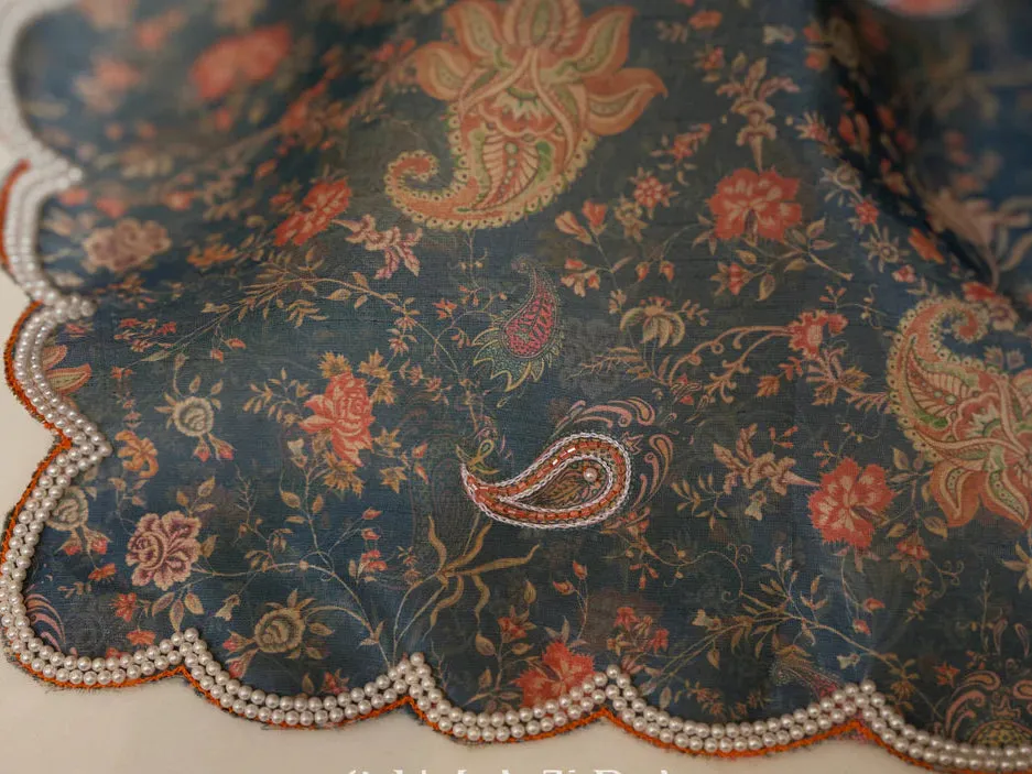Floral printed saree with delicate hand embroidery and scalloped embroidered edges
