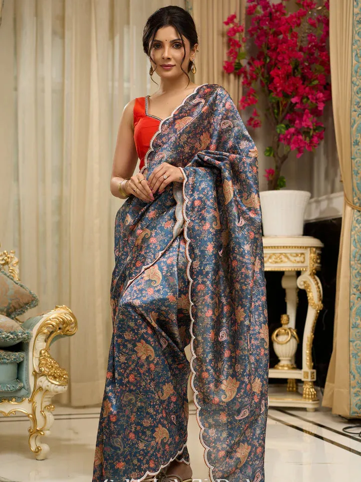 Floral printed saree with delicate hand embroidery and scalloped embroidered edges