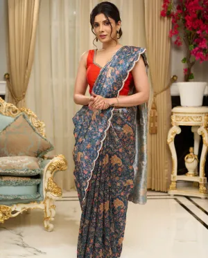Floral printed saree with delicate hand embroidery and scalloped embroidered edges